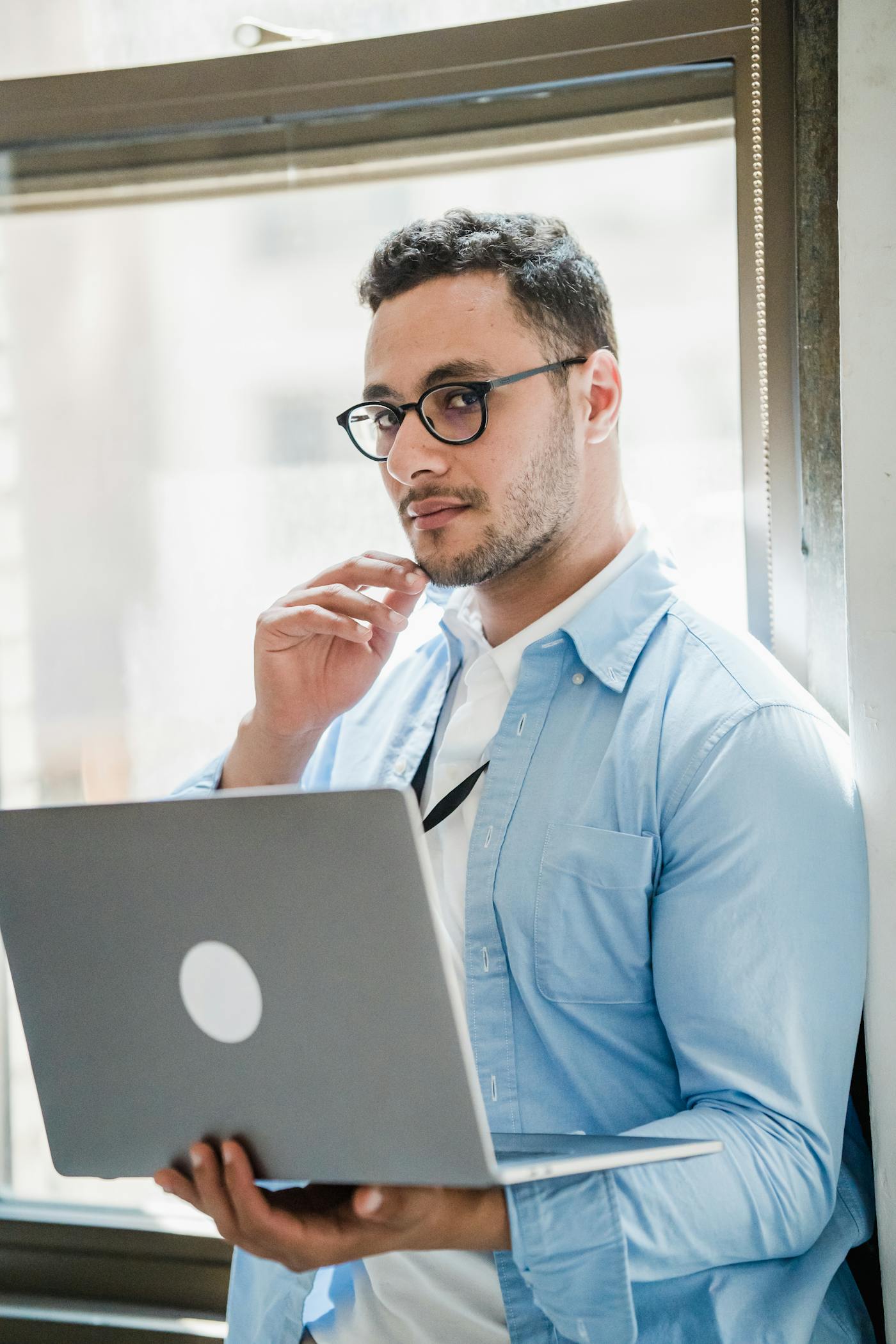 Business owner reviewing digital growth on a laptop